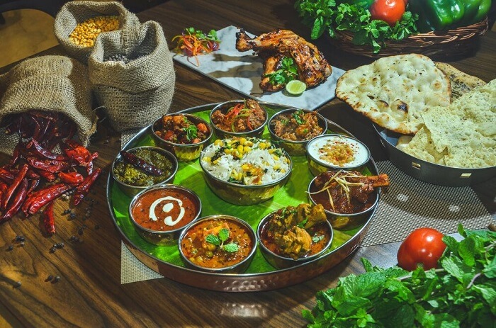 traditional food of Punjab, Kadha Prashad, Pinni,, Punjabi Chhole Masala, Dal Makhani, Aam Papad, Sarso ka Saag & Makke ki Roti,Dhaba Dal, Kadhi Chawal, Bhatti Da Murg, Pindiwala, Panjiri